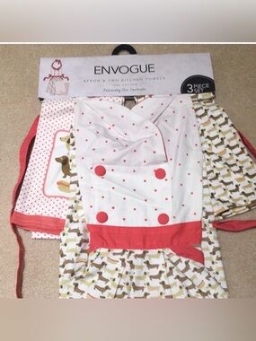 Dachshund themed apron and dish towel set .